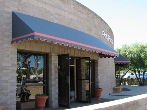 Pat Fisher Fashions - Notice the awning is on a CURVED Building