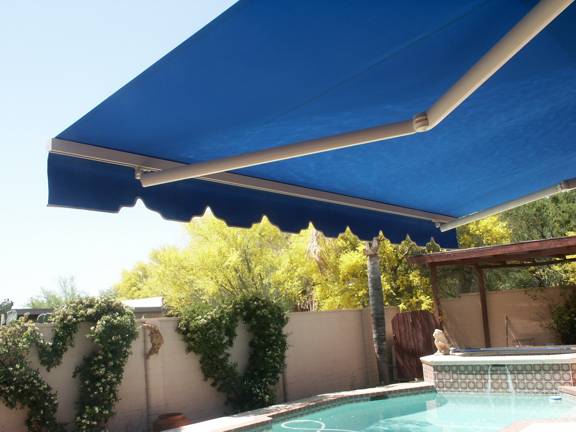 Beautiful backyard pool side retractable awning.